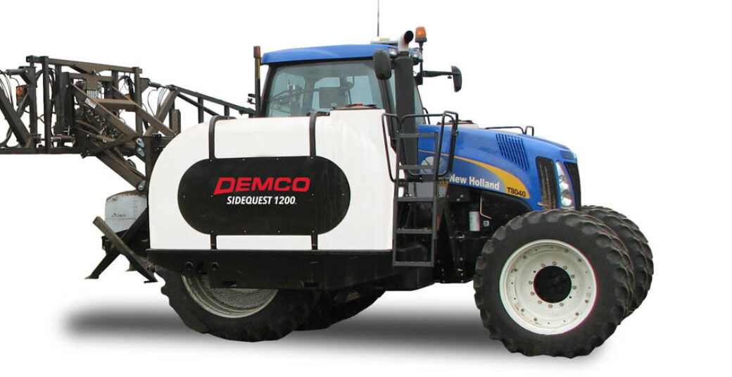 Demco 1200 Sidequest sprayer on New Holland Tracot
