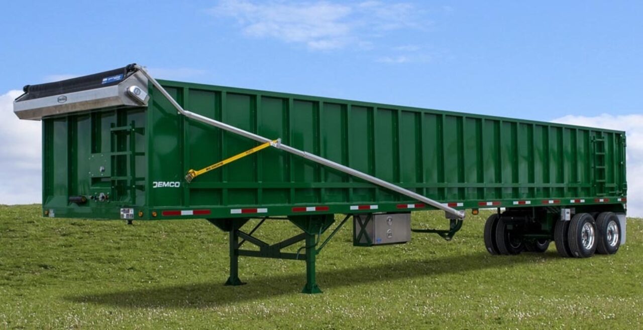 Green scrao trailer on grass