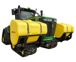 Green tractor with tractor mounted fertilizer tanks